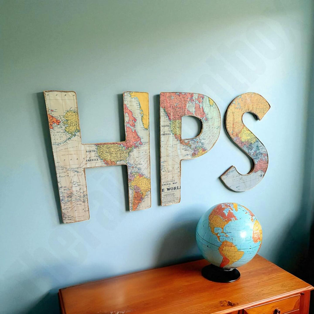 World Map Globe Themed Monogram Wood Letters that hang in a child's travel themed nursery room.